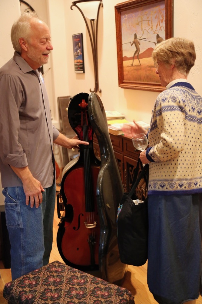 Jim (with Joan), warming up his cello - did you see the video of him performing with Kim?